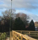 Telescopic floodlighting mast for horse arenas.